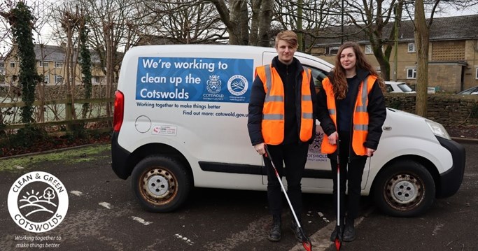 Two clean and green officers with litter picks